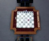 The chess board seen from above, with its house rules different from real chess.