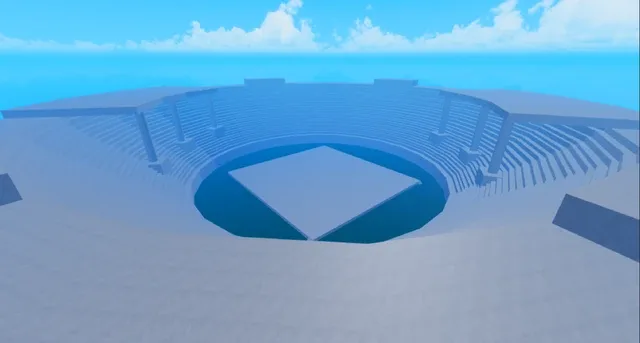The large gray coliseum arena, with its square area in the center.